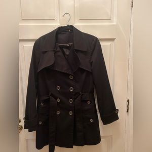Calvin Klein women’s trench coat. Mid length with tie and silver buttons